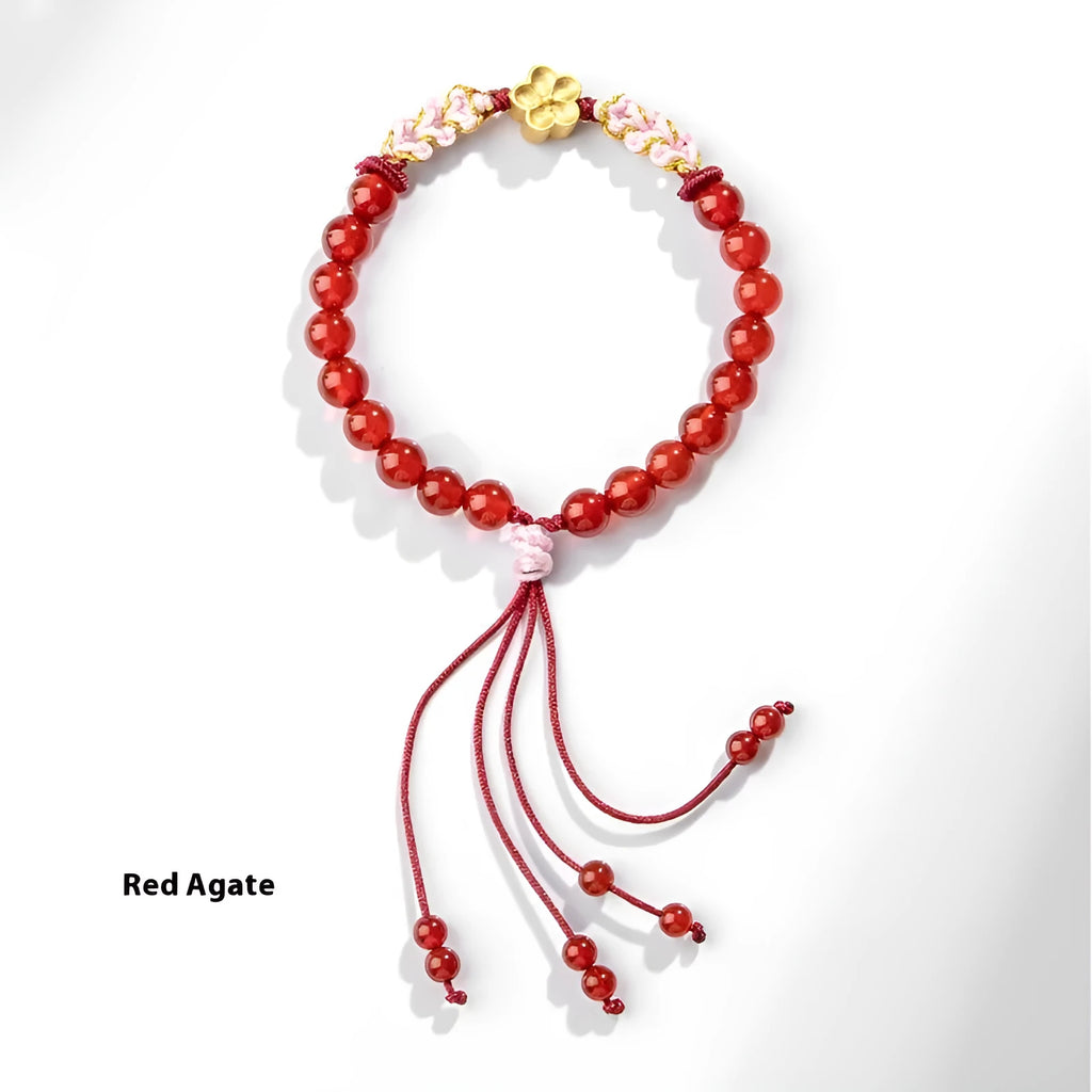 Chinese style hand-woven red rope bracelet with natural crystal peach blossom charms