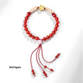 Chinese style hand-woven red rope bracelet with natural crystal peach blossom charms
