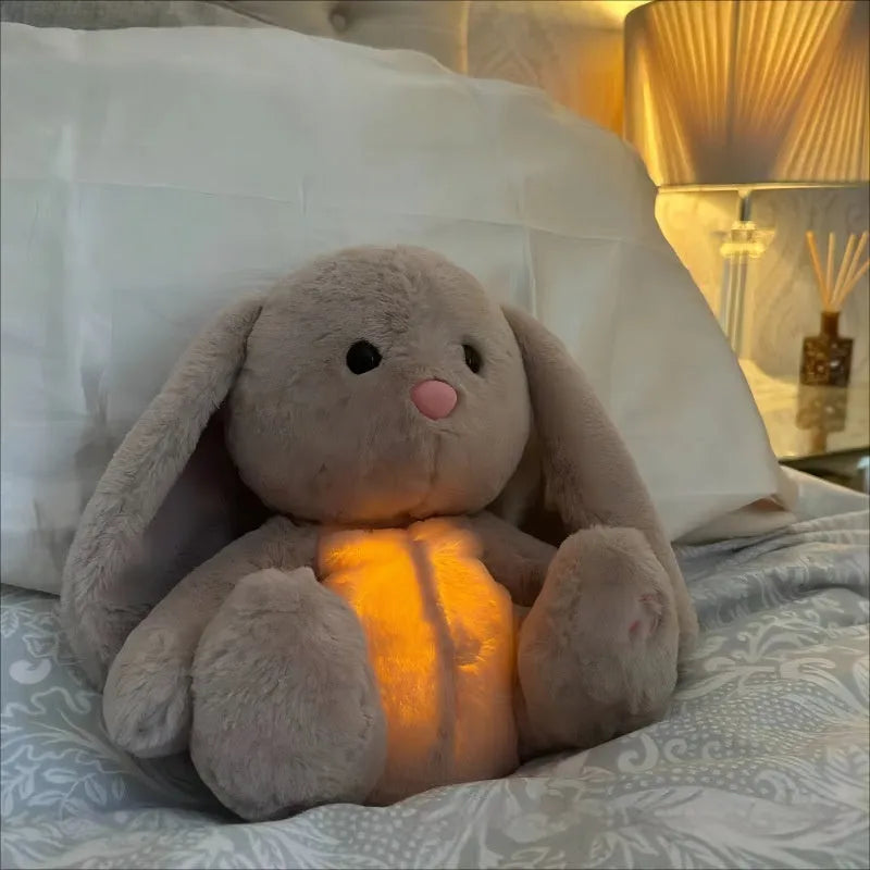 Breathing rabbit plush toy with moving belly showing rhythmic breathing motion for baby comfort