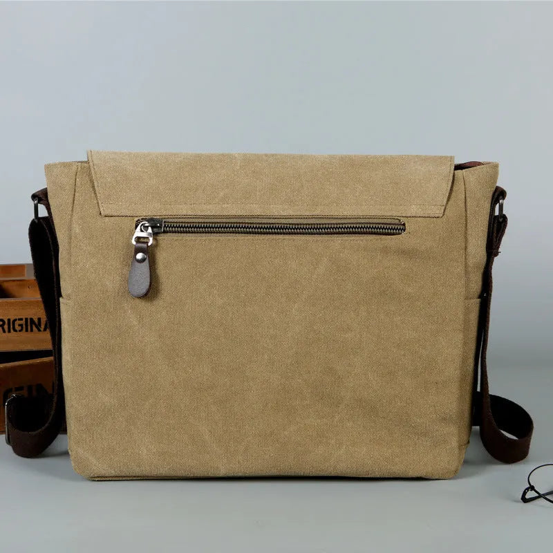 High density canvas retro travel bag in solid khaki colour with visible sewing thread detailing