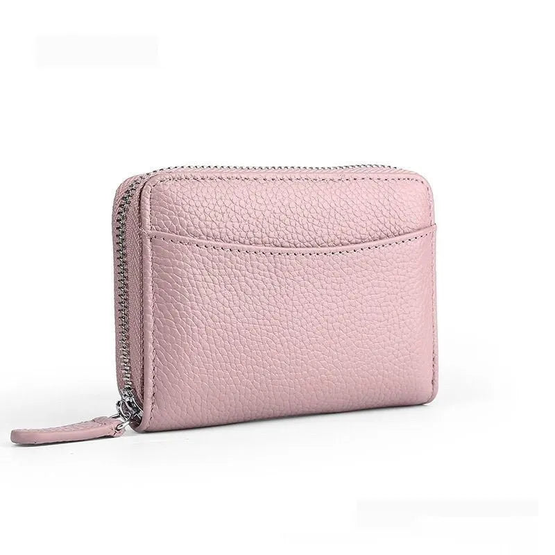 Genuine leather zipper coin purse in solid colour with anti-theft feature and sewing line detail.