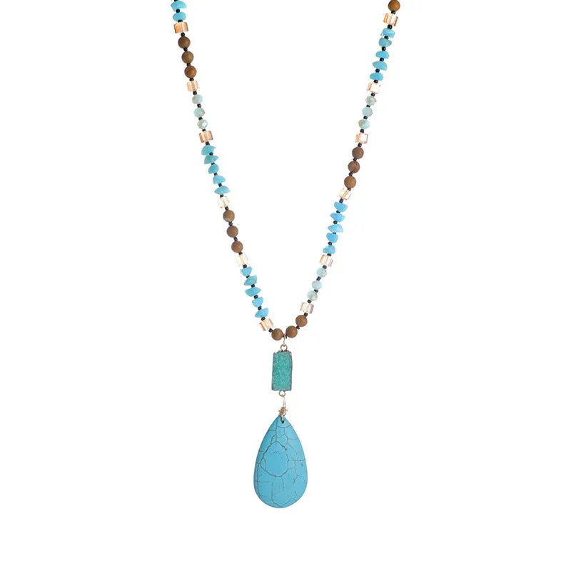 Blue turquoise heart and water drop shape pendant necklace with mixed gem inlay on a ball bead chain.