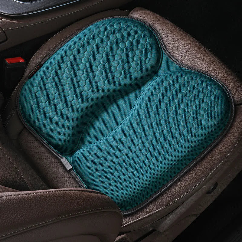 Honeycomb patterned gel car seat cooling cushion in multiple colour options on a car seat.