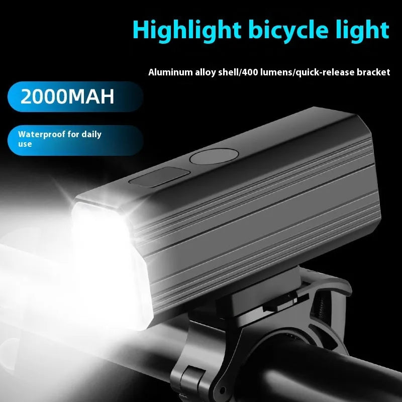 Aluminium alloy mountain bike headlight with silicone mounting bracket, showing scale and TPYE-C charging port.