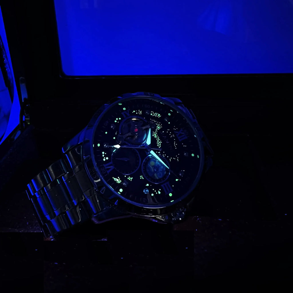 Men's automatic mechanical watch with rose gold case, black dial, and large multifunctional display.
