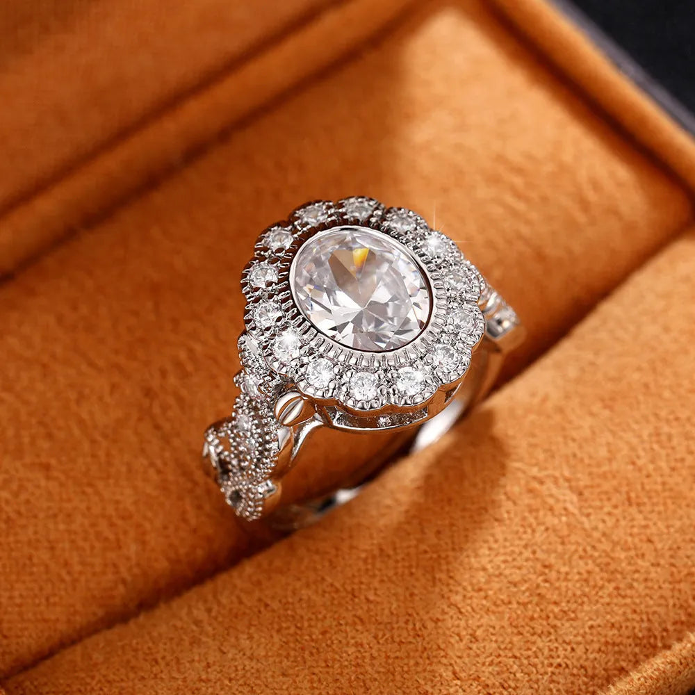 Geometry style ring with round zircon stone and diamond plating in white gold colour