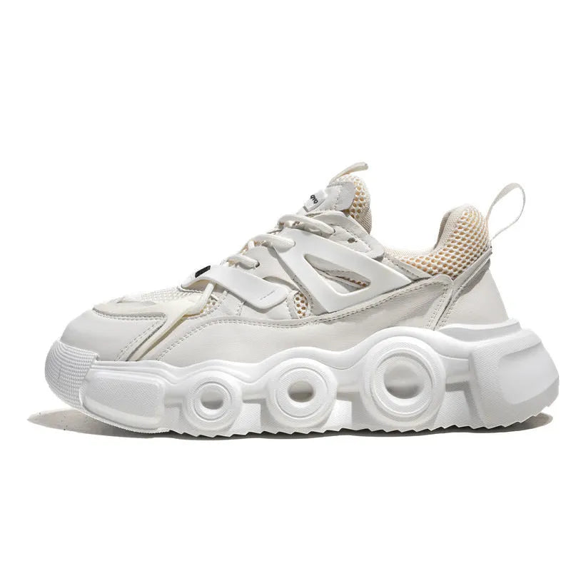 Men's low-top sneaker in grey with breathable mesh upper, thick rubber sole, round toe, and lace-up front.