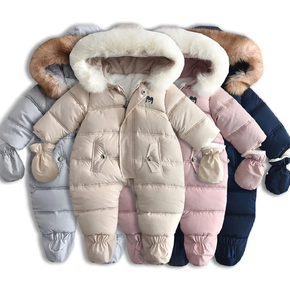 Fleece-lined thick hooded baby jumpsuit in beige with zip front and fur hood