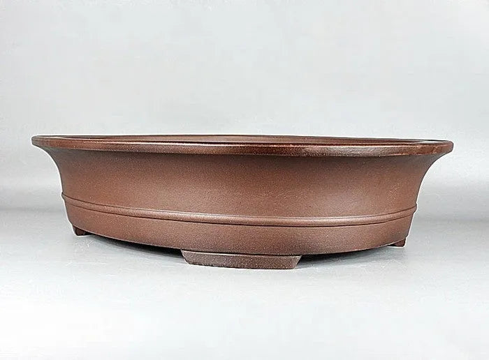 Handmade antique oval Yixing Purple Mud bonsai pot with dimensions 66x53x14.5cm for pine and cypress