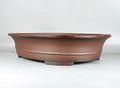 Handmade antique oval Yixing Purple Mud bonsai pot with dimensions 66x53x14.5cm for pine and cypress