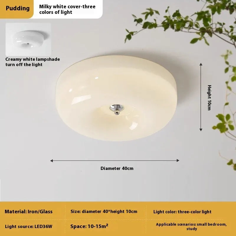American style cream coloured bedroom ceiling lamp with three-colour light fitting on a white ceiling.