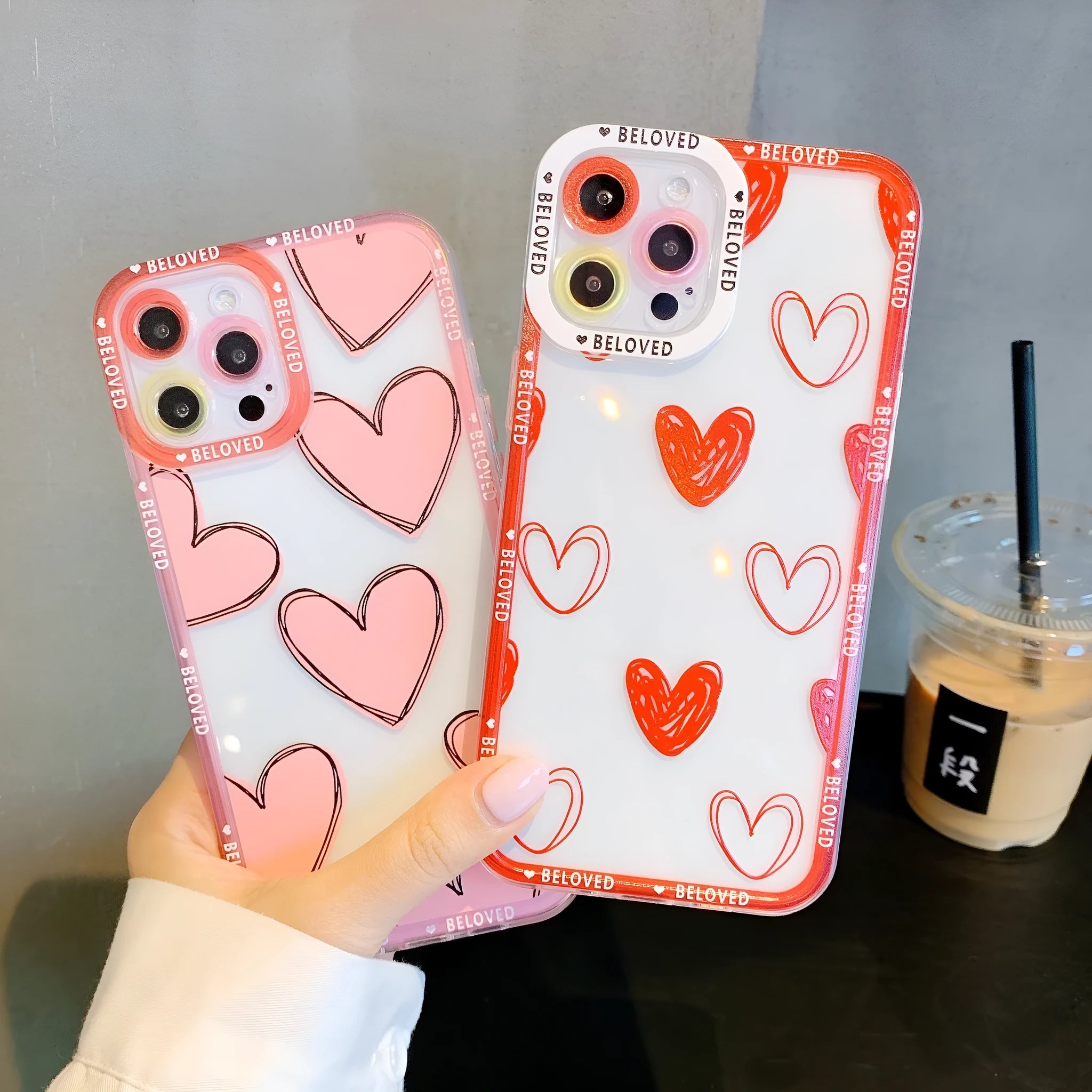 Pink mobile phone case with love heart and angel eyes design for iPhone.