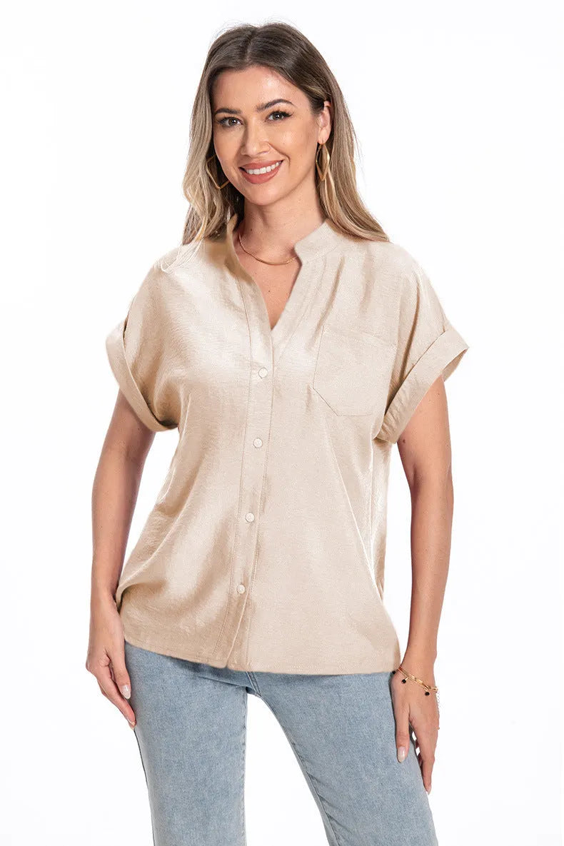 Women's stand collar button front short sleeve top in loose fit polyester with raglan sleeves