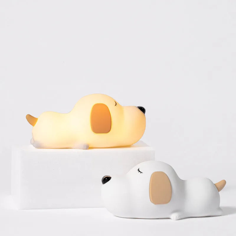 Silicone cartoon dog night light with two colours and a USB cable.