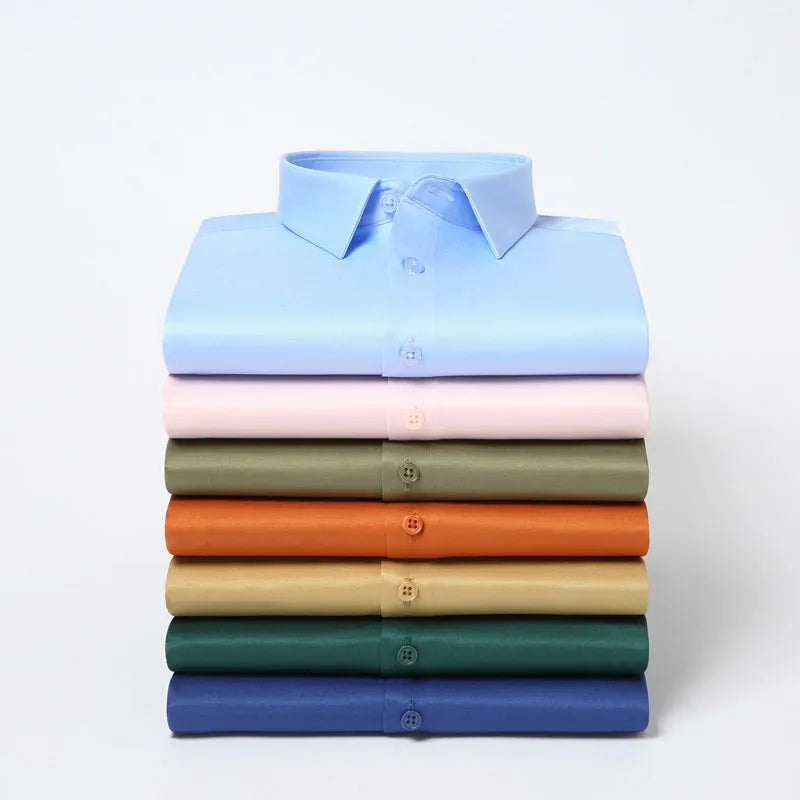 Men's loose fit long-sleeved non-ironing shirt in a solid colour, made from breathable polyester spandex fabric.