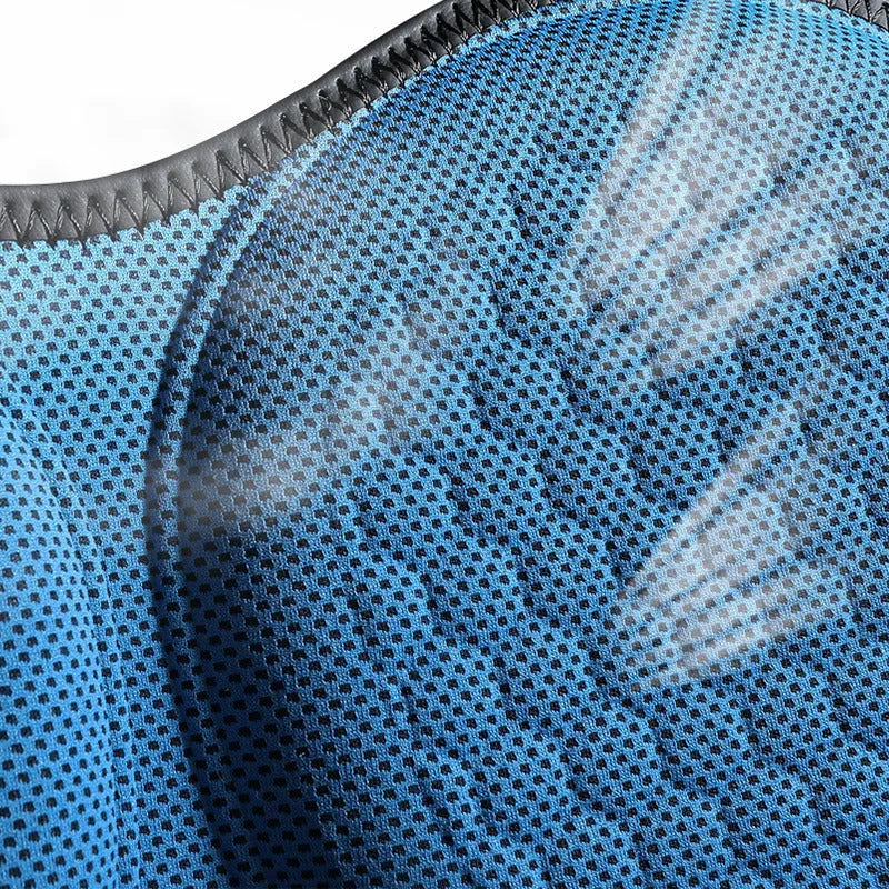 Honeycomb patterned gel car seat cooling cushion in multiple colour options on a car seat.