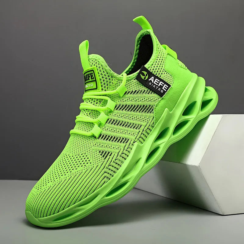 Men's casual running shoes with mesh upper in black colour showing cross strap details and low-top design