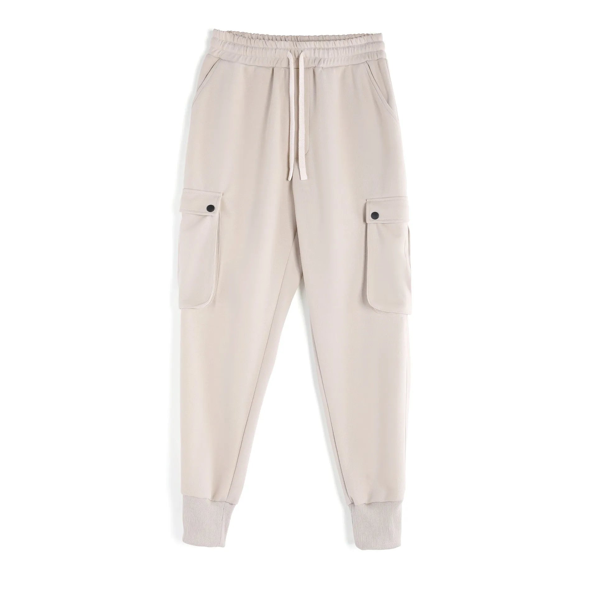 Men's loose-fit beige cotton trousers with tied ankle cuffs and multiple pockets on the legs.