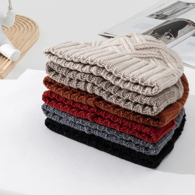Women's wool knitted dome crown winter hat with a totem pattern, shown in one of six available colours.
