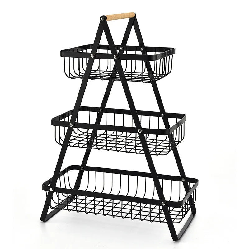 Black detachable double-layer iron fruit basket with wooden handle on tabletop