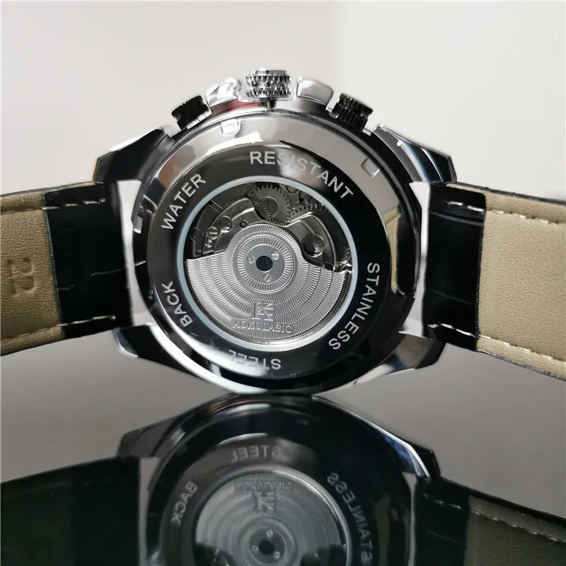 Men's automatic mechanical watch with a 12mm case in silver, black, and gold colour options on a wrist.