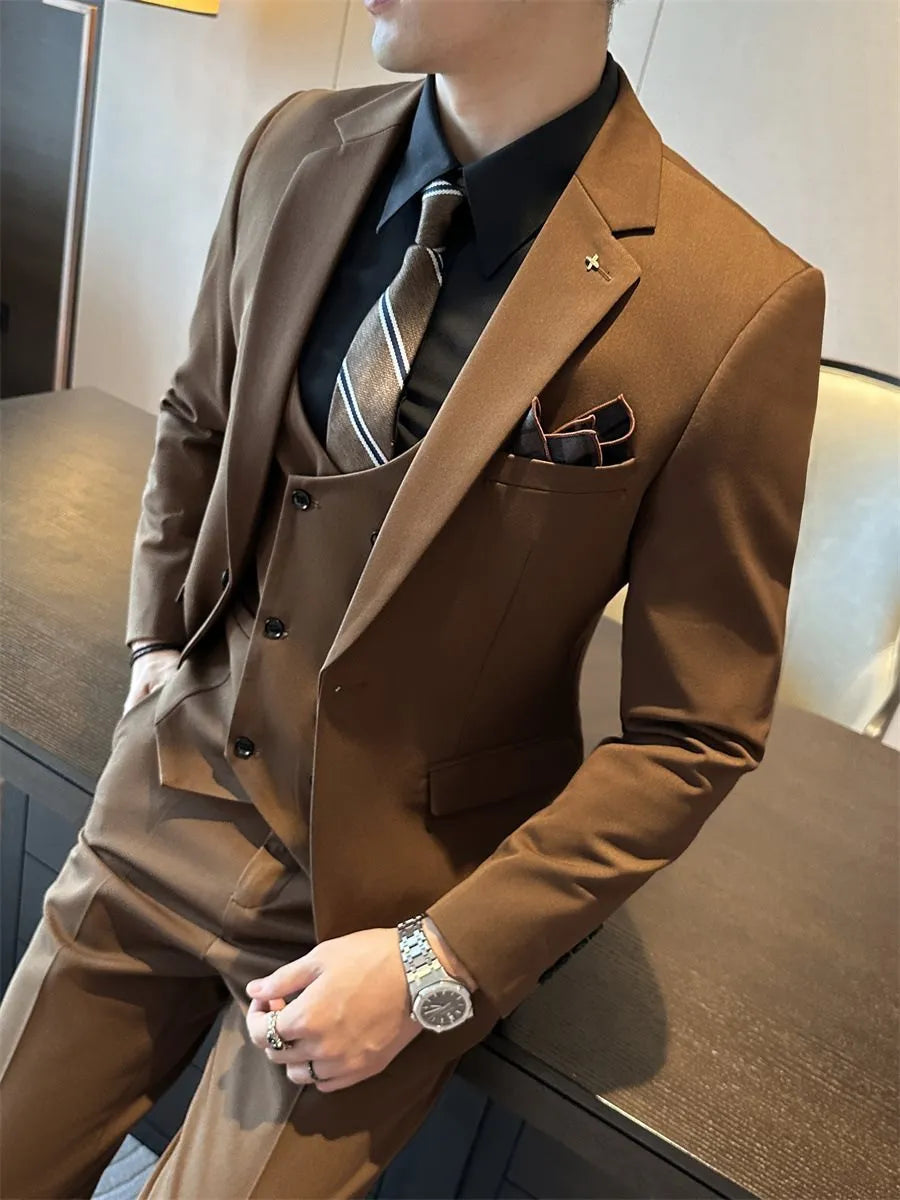 Men's slim fit dark green business suit jacket with structured shoulders on a hanger.