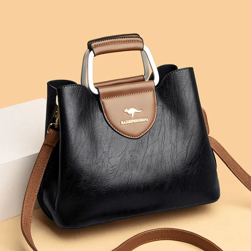 Women's barrel crossbody shoulder bag in soft PU with zip pocket and document pocket, shown in one of six colours