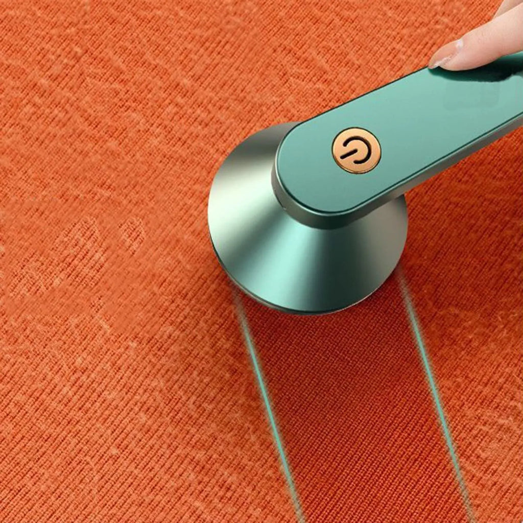 White or green USB-rechargeable electric lint remover with removable lint collection container