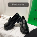 British style wide fit patent leather loafers with a muffin heel and rubber sole.
