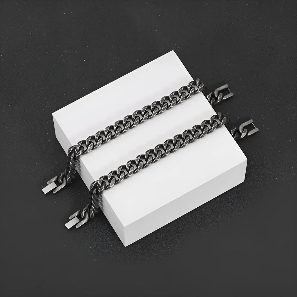 Silver titanium steel geometric minimalist cuff bracelet on flat surface showing 10mm width