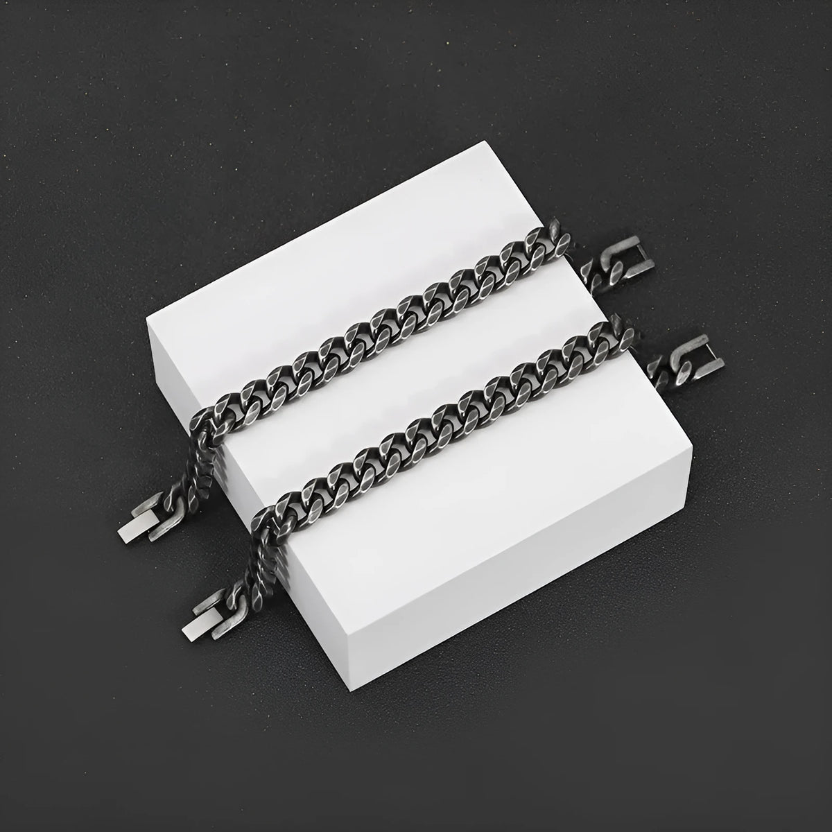 Silver titanium steel geometric minimalist cuff bracelet on flat surface showing 10mm width