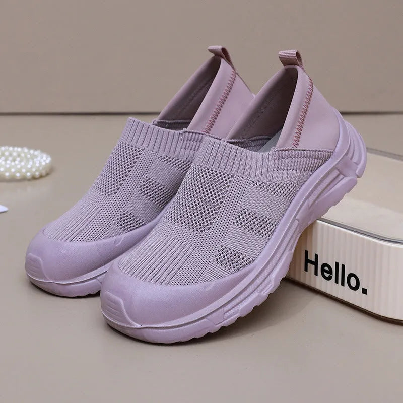 Women's slip-on casual shoes with cloth uppers and soft PVC soles in round toe design