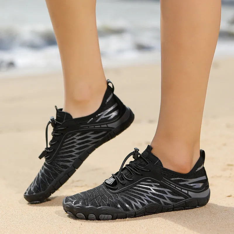Unisex water shoes with non-slip rubber sole and Velcro closure in black and blue colour option