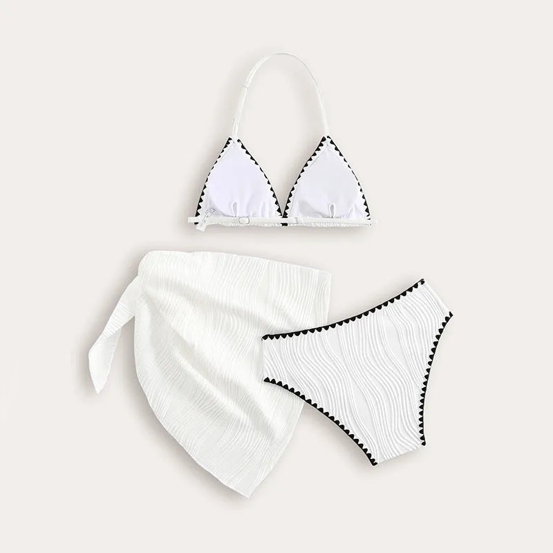 White solid colour three-piece swimsuit set for girls with top, pants, and skirt