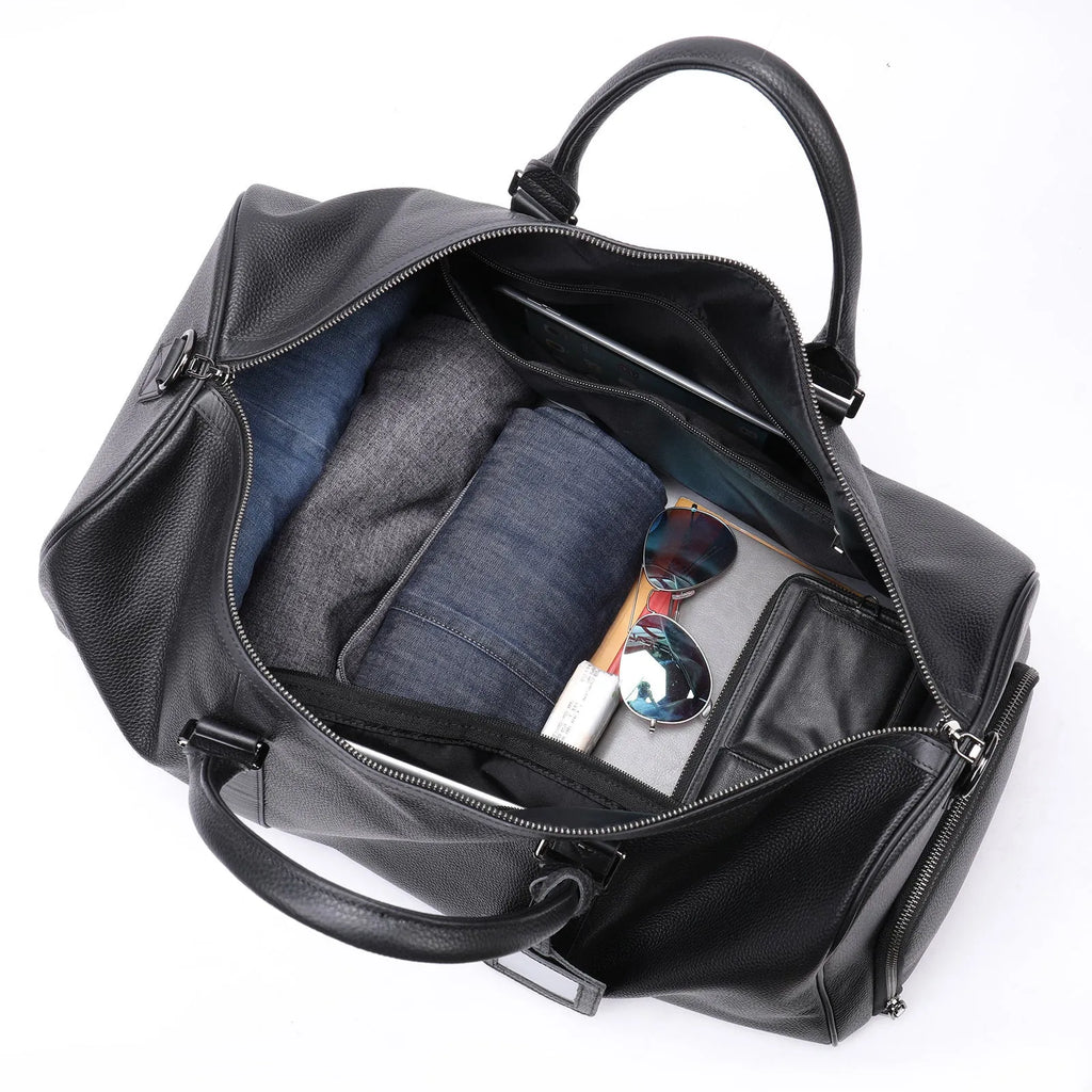 Men's black leather excursion bag with single strap and large capacity