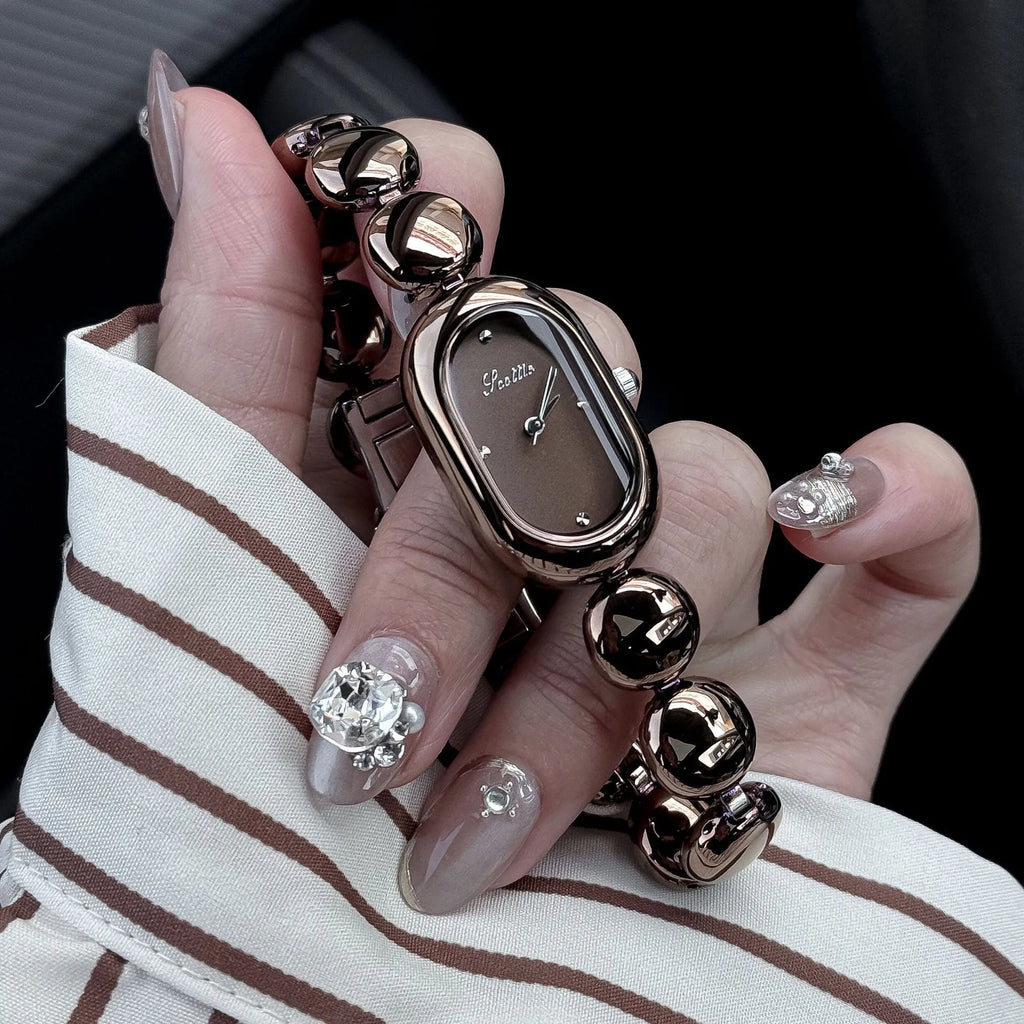 Women's oval fashion watch with bracelet strap in one of seven colour options.