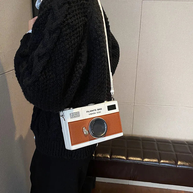 Soft PU mini crossbody camera bag in a horizontal square design with an adjustable strap