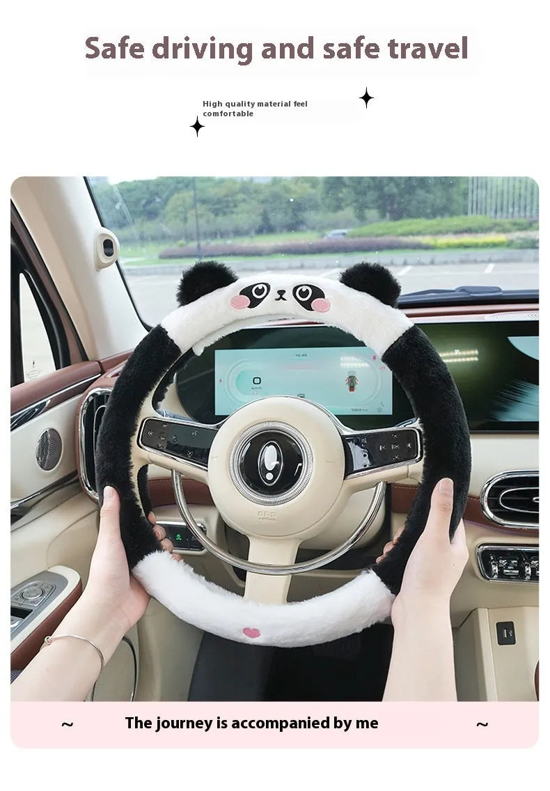 Rabbit fur plush steering wheel cover with embroidered panda, fitted on a 38cm car steering wheel.