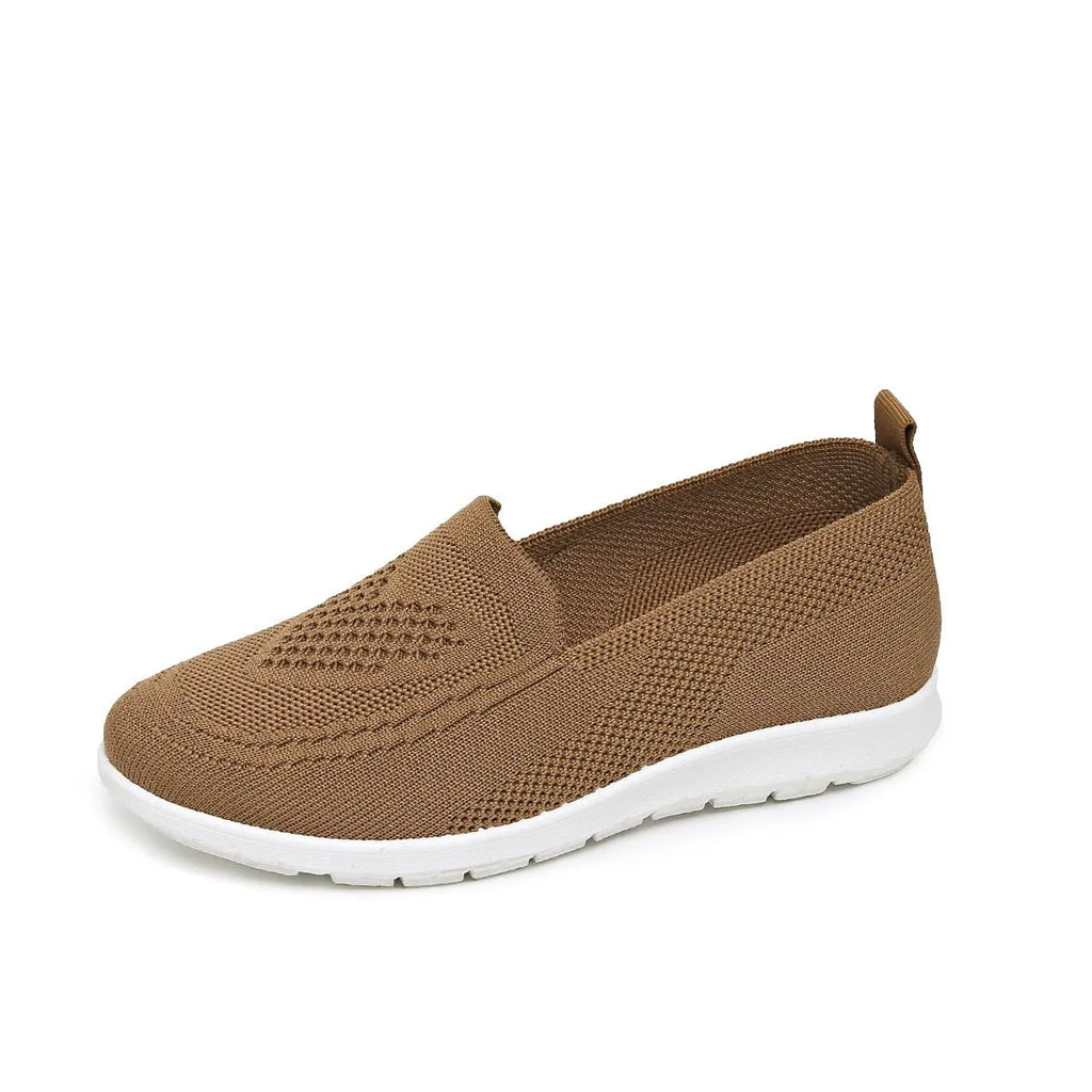 Women's plus size low-top casual cloth shoes with heart pattern and mesh lining in beige.