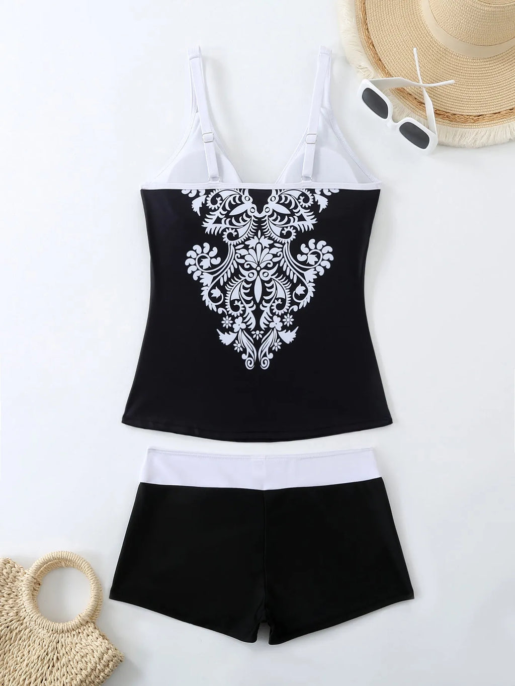 Women's plus size printed swimsuit in black or rose red with briefs style.