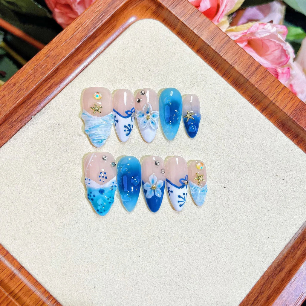 Blue hand-painted carved summer ice transparent plastic fake nails set with decorative surface detailing