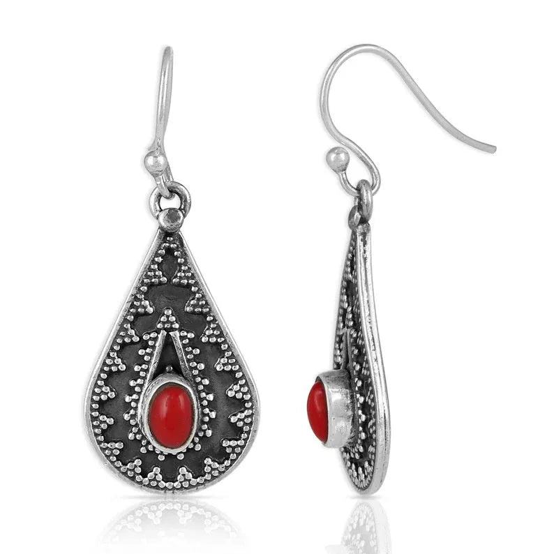 Silver drop earrings with a red pine gemstone in a retro zinc alloy setting.