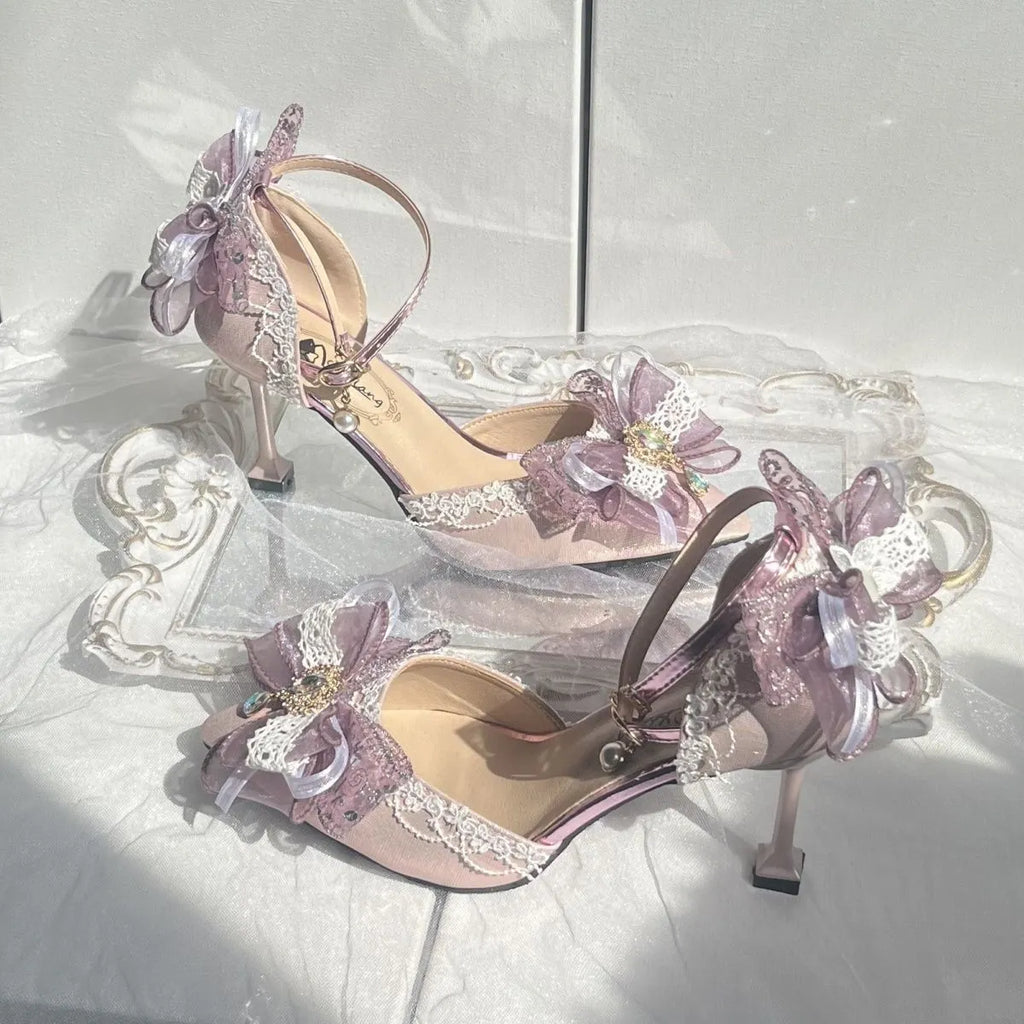 Purple satin Lolita wedding shoes with a square toe and stiletto heel on a composite sole.