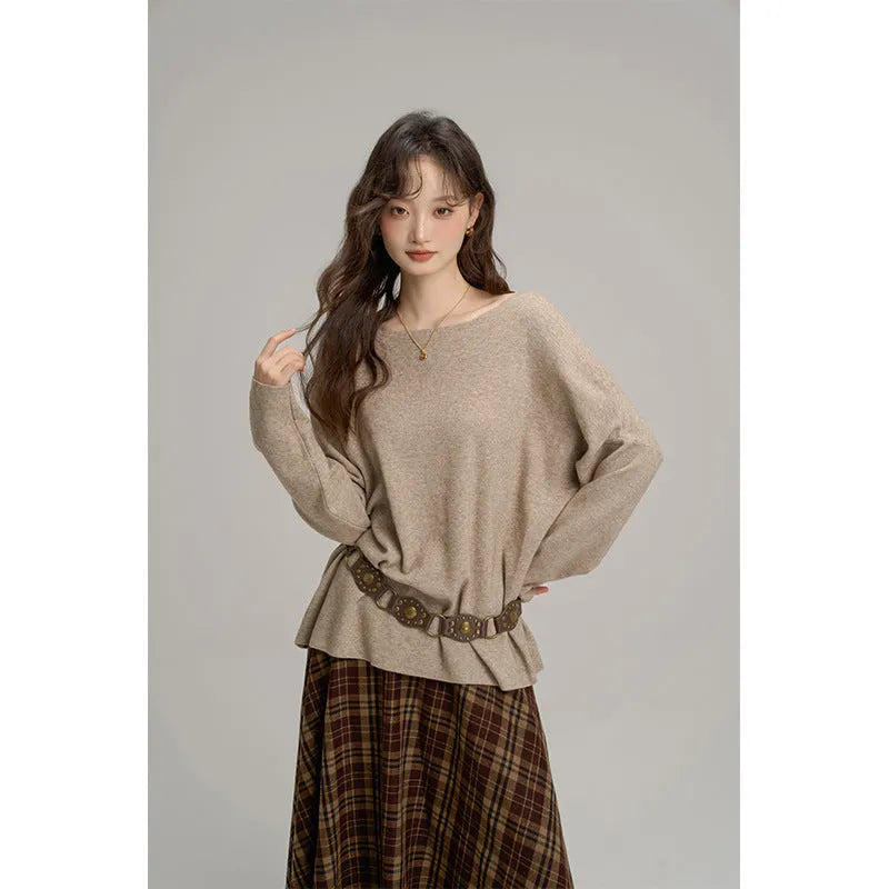 Oblique shoulder soft knit top for women in oatmeal colour with collarbone reveal detail
