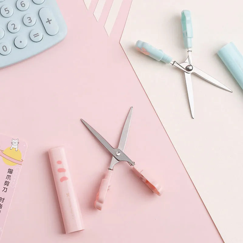 Cat claw folding pen-type scissors, 1.3cm x 8.7cm ABS+ body, shown in Black, Blue, Pink and White