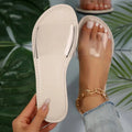 Women's transparent PU slippers in rose red, white and brown colours showing flat sole design