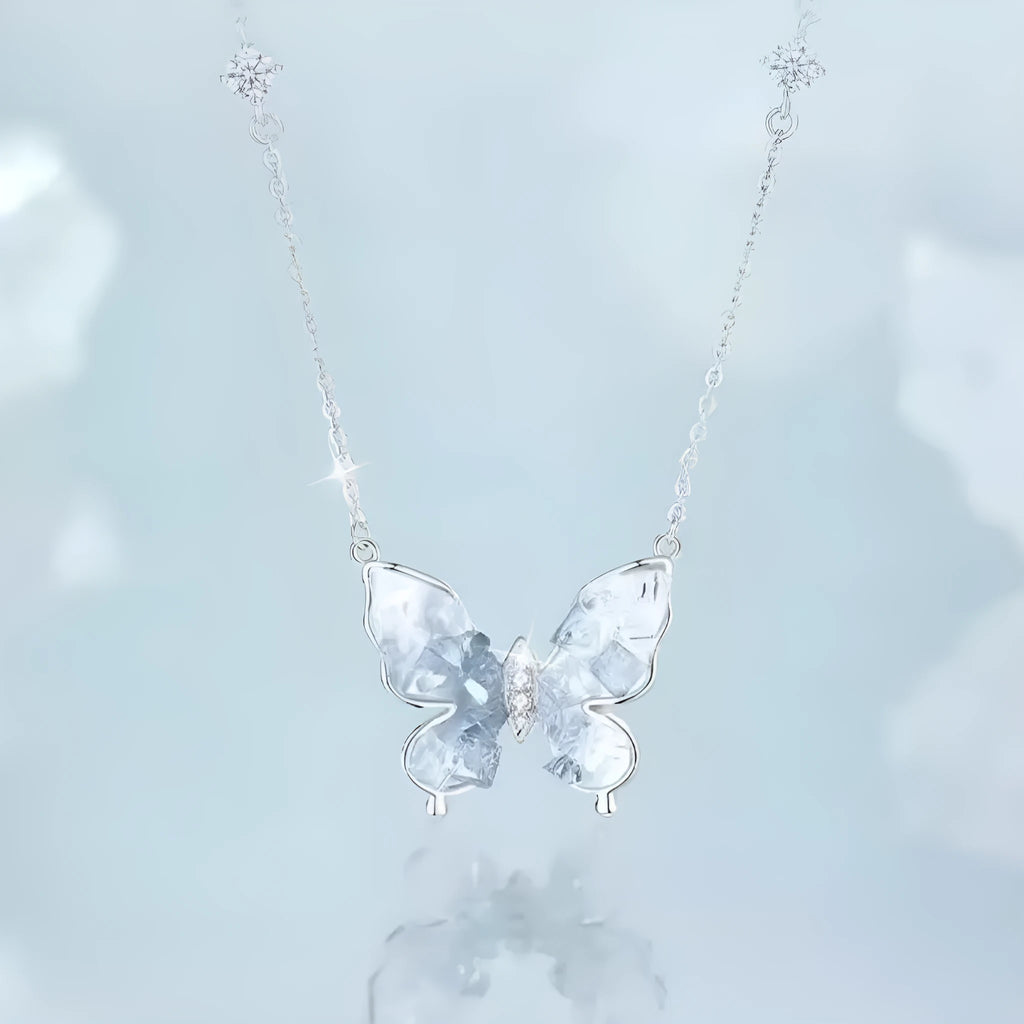 Bingyu adjustable silver butterfly necklace on a dark background, showing the icy electroplated pendant and O-ring chain.