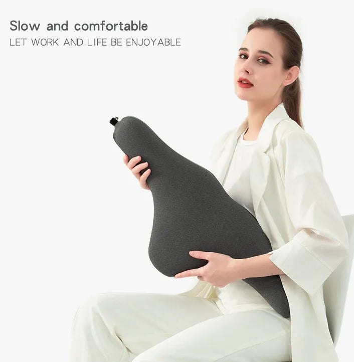 Solid-colour memory foam car neck pillow on a car headrest in dark grey, grey, or fog blue