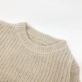 Children winter cotton oversized sweatersuit top in vanilla colour, laid flat showing front design for babies and toddlers