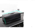 Black leather hanging storage box with strap handles for car and home organisation